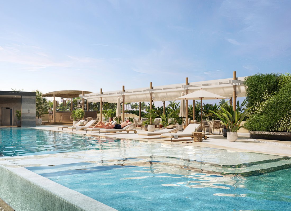 Essence — ground-level pool deck with loungers