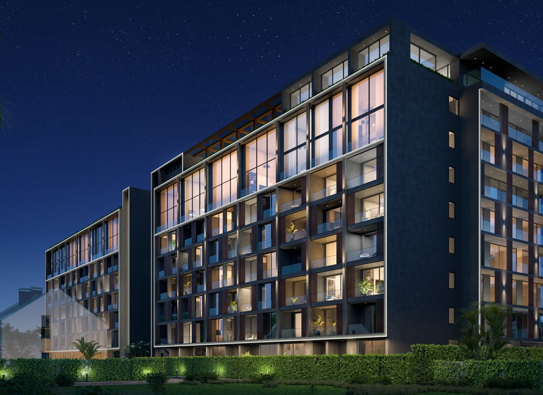 Essence — building facade close-up at night